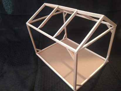 An assembled roof attached on top of the assembled columns and foundation box.