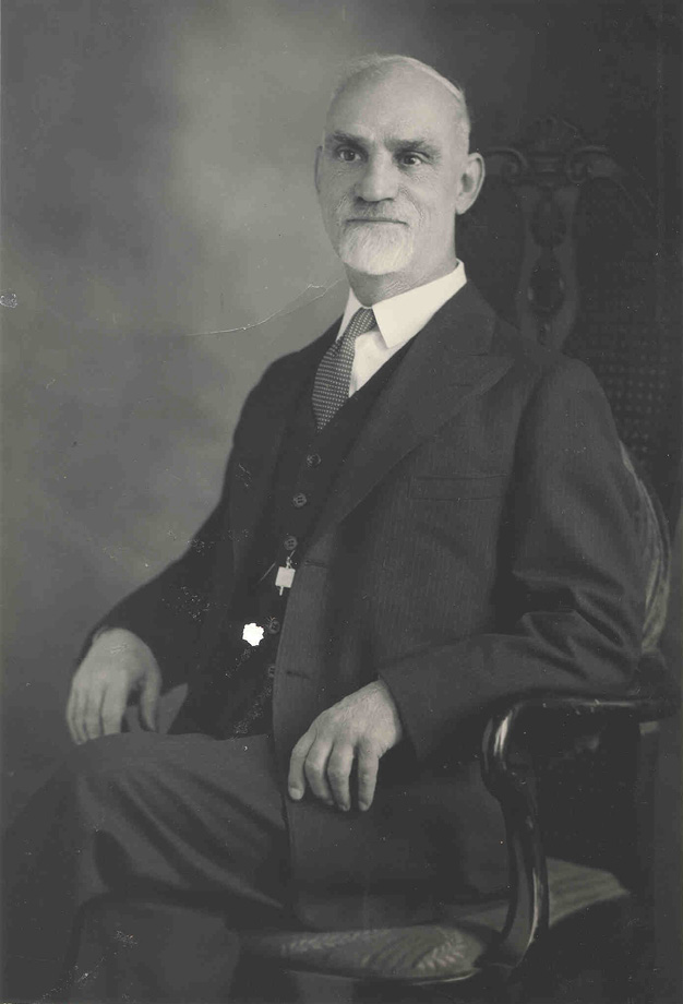 Black and white photo of Dr. Newel Perry.