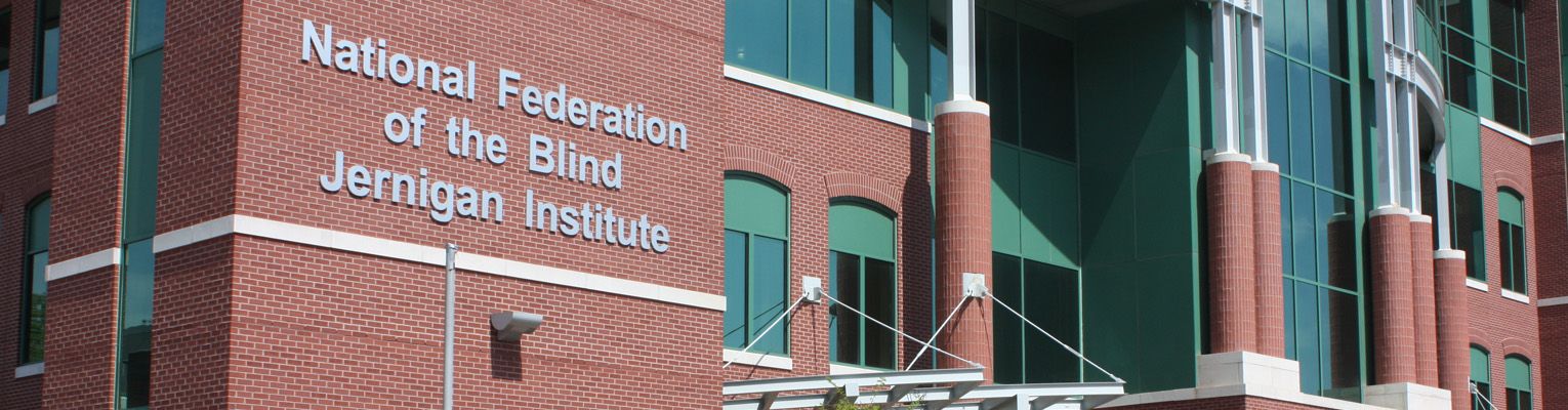close up shot of the National Federation of the Blind Jernigan Institute main entrance on east Wells Street with the National Federation of the Blind Jernigan Institute building  sign showing. 
