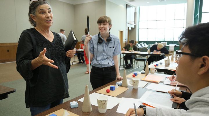 A teacher addresses a class during the NFB EQ program.