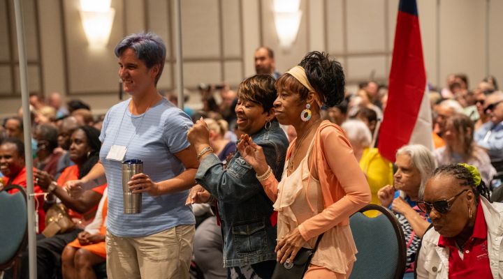 Three blind women dance during the opening session