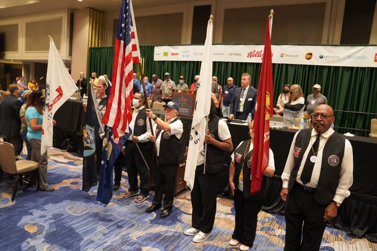 The color guard presents flags at opening session
